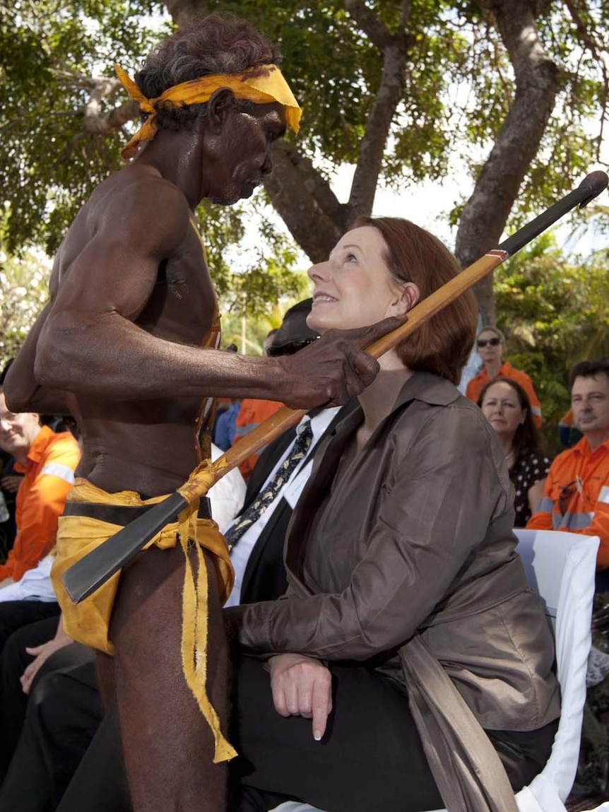 Timmy Ganambarr dances with Julia Gillard