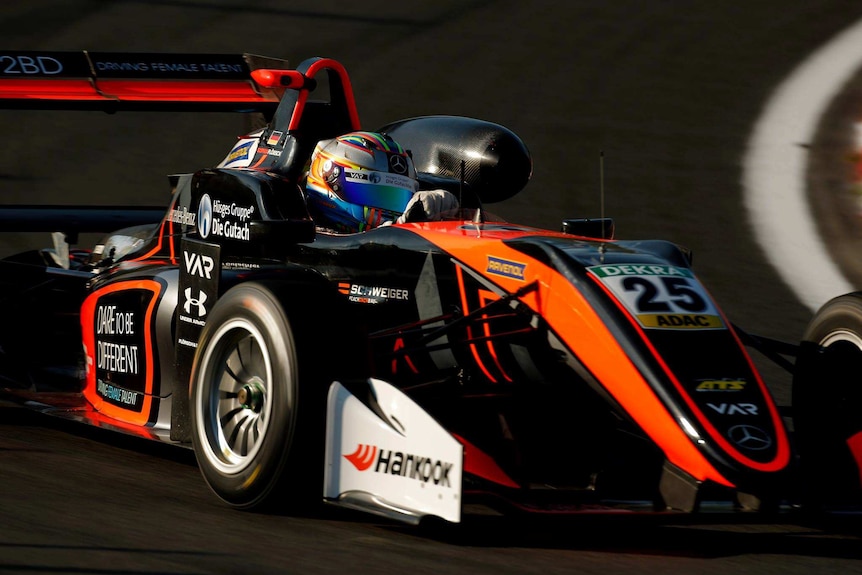 Sophia Floersch driving in a Formula Three car.