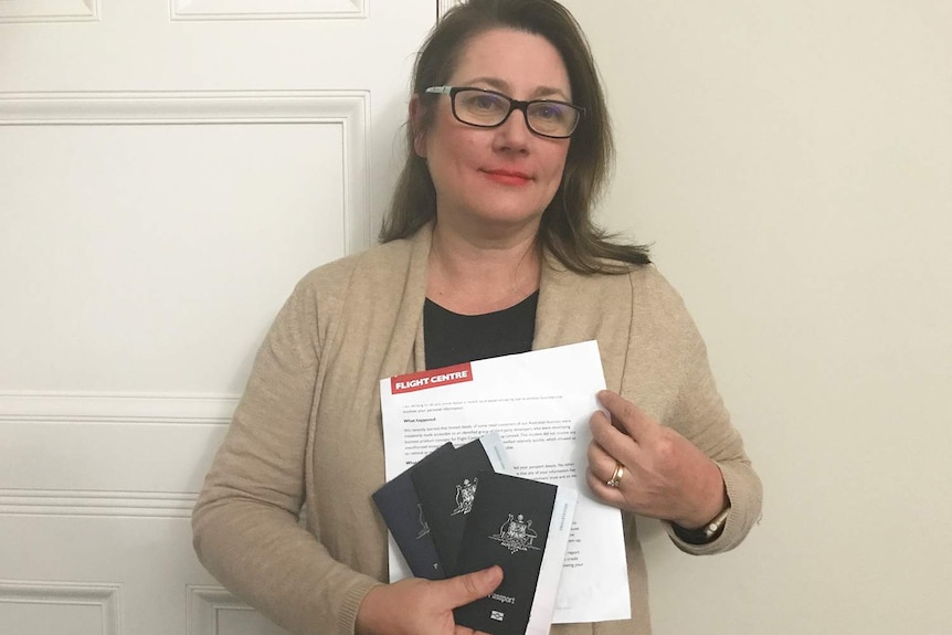 Sydney woman Dr Yvonne Skarbek holds her cancelled passports and a letter from Flight Centre on August 9, 2017.
