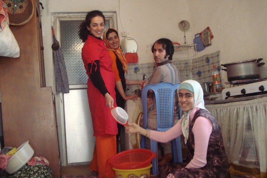 Masih in the kitchen of their Iran home