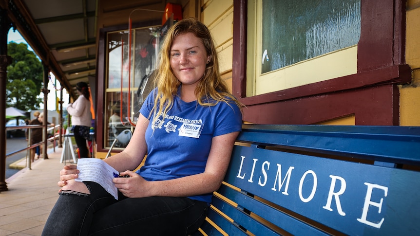 Maddy Braddon on bench seat at Lismore train station