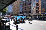 Paramedics on the scene in Flinders Street treating the injured.