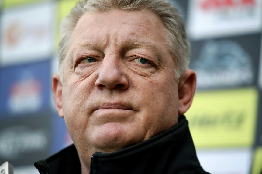 Phil Gould looks to his left.