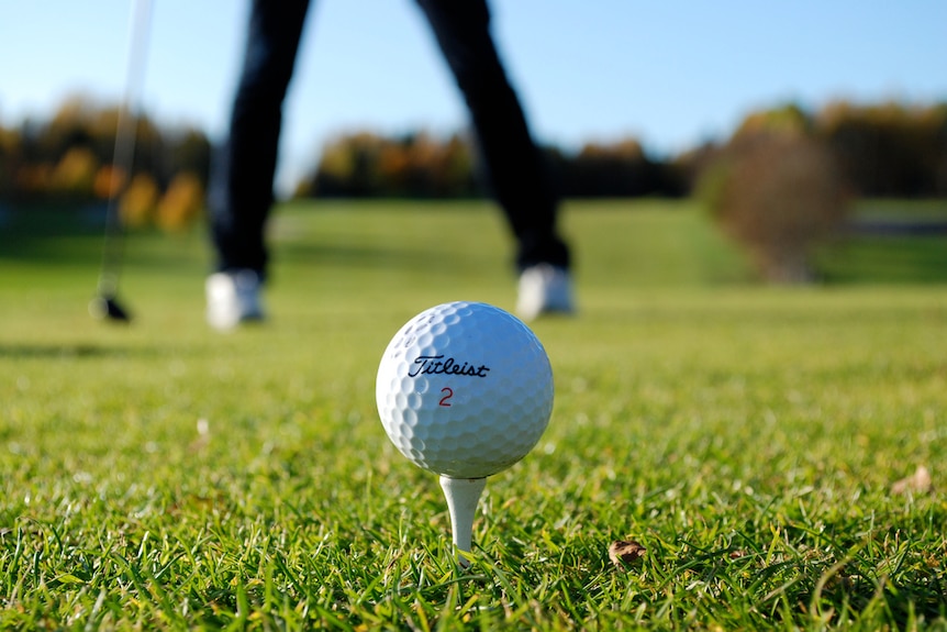 A person playing golf in retirement