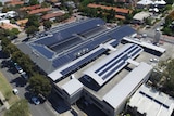 An aerial view of Broadway Shopping Centre which has had its roof covered in solar panels.