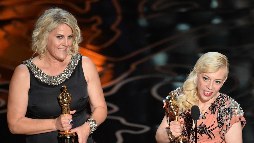 Catherine Martin and Beverley Dunn win best production design at the 86th Academy Awards on March 2, 2014.