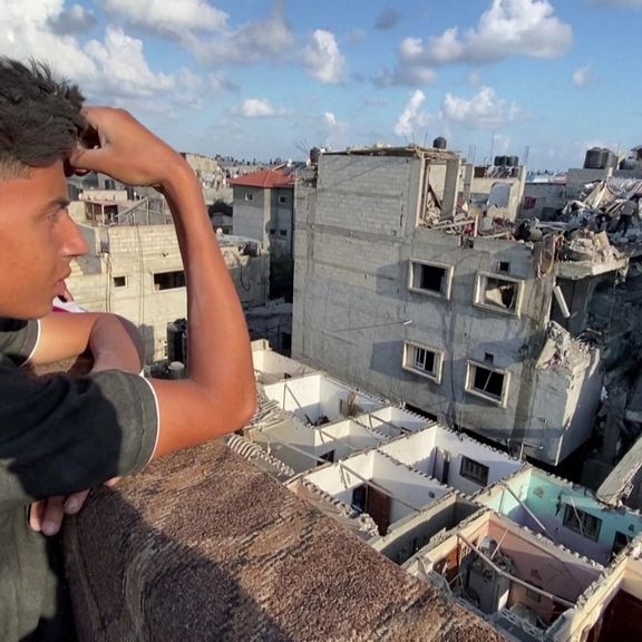 Palestinians search through rubble after Rafah airstrikes