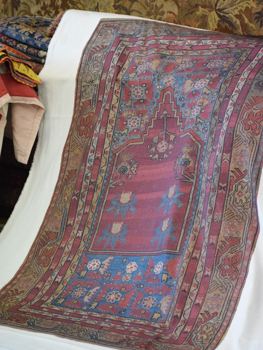 A print-out of a digital reconstruction of a prayer rug.