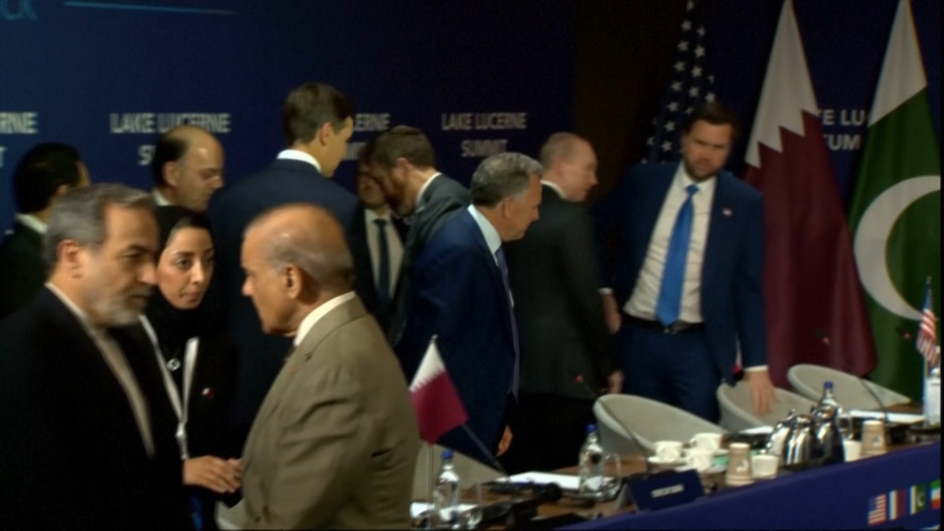 JD Vance is seen takling to officials as he watched the Iranian delegation walk out of the room.