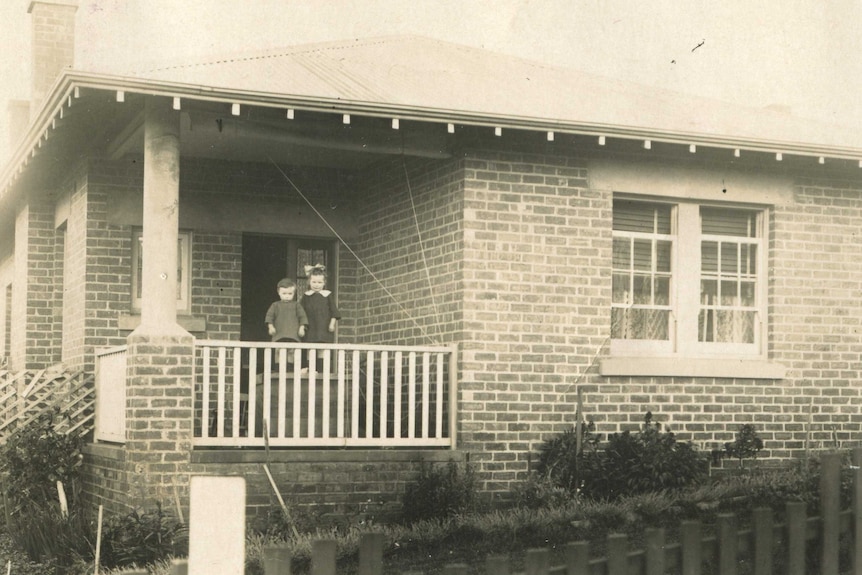 Two children in front of a house in East Launceston in 1924