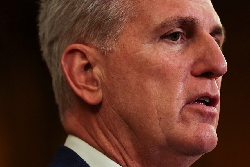 A close-up on Kevin McCarthy's face shows a neutral expression