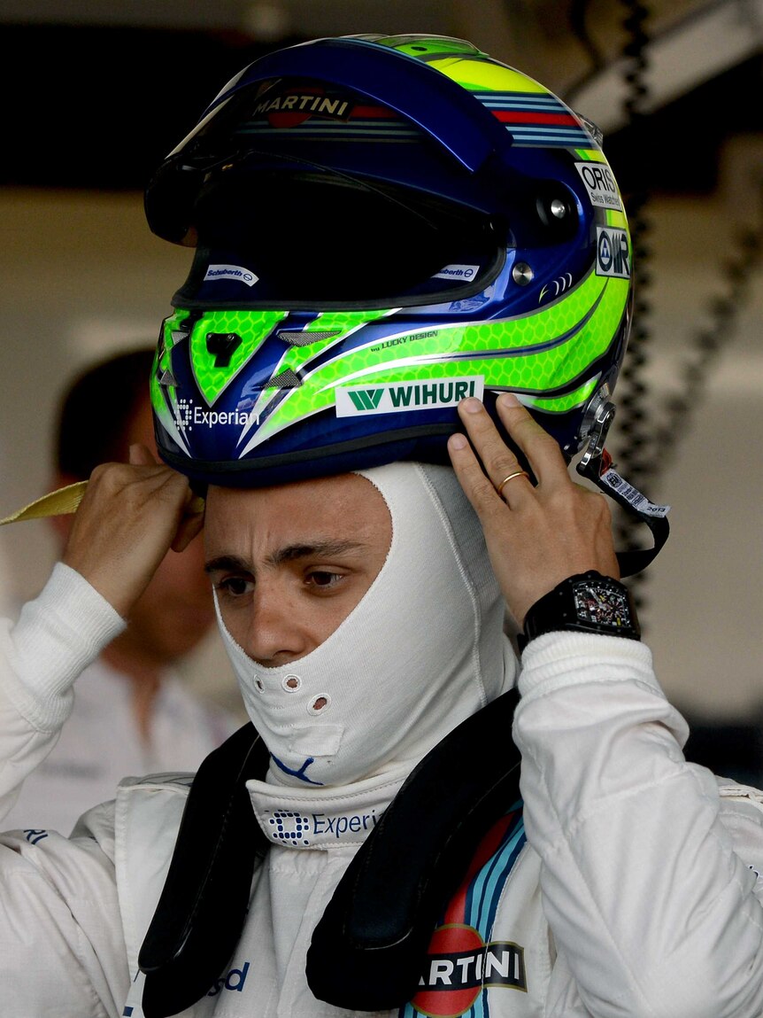 Felipe Massa dons helmet before Australian GP practice
