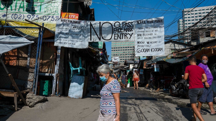 A woman in a face mask