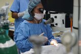 A surgeon operates during cataract surgery