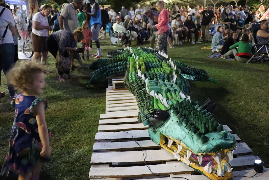 A green 6.2m crocodile sculpture made of waste and egg cartons. 