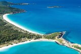An aerial view of Great Keppel Island, white sand, blue water.