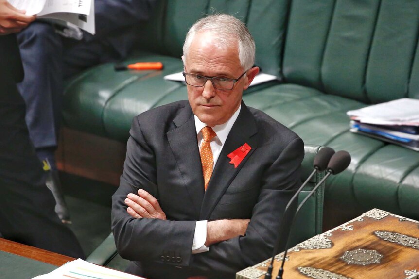 Malcolm Turnbull crosses his arms in parliament