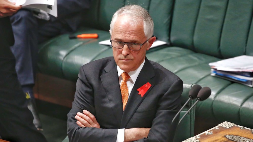 Malcolm Turnbull crosses his arms in parliament