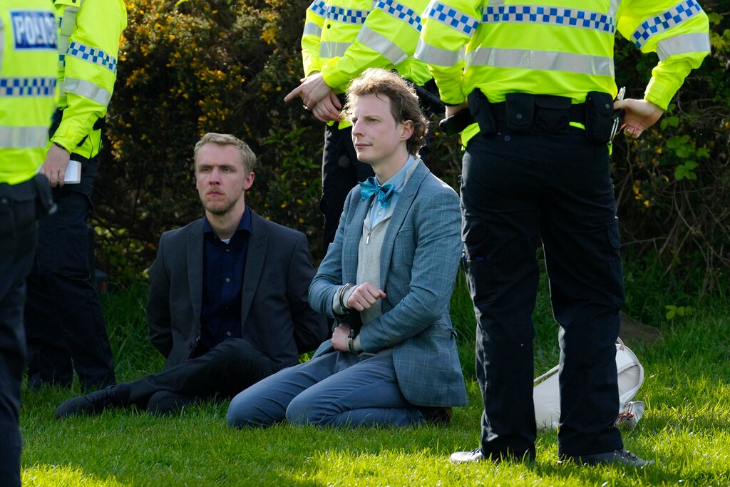 More than 100 animal rights activists arrested in UK, delaying Grand ...