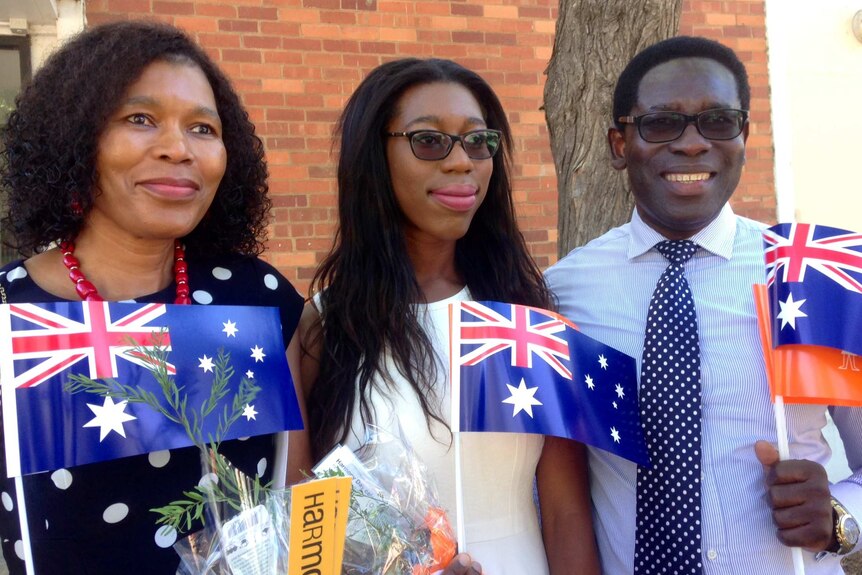 Bongi, Charlotte and Chris Tabi became citizens at a Harmony Day citizenship ceremony in Barton today.