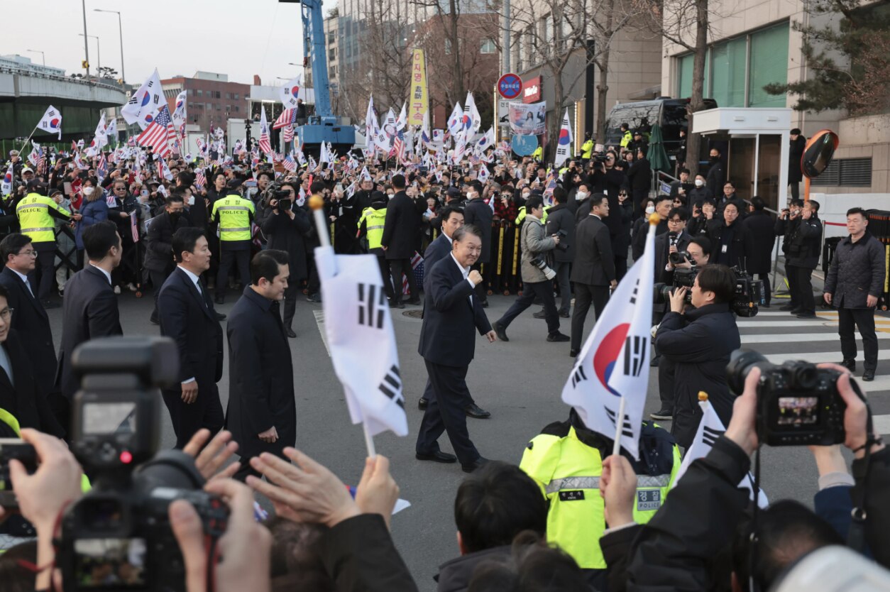 Impeached South Korean president Yoon Suk Yeol greeting supporters