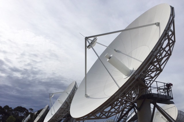 Satellite dishes in a row