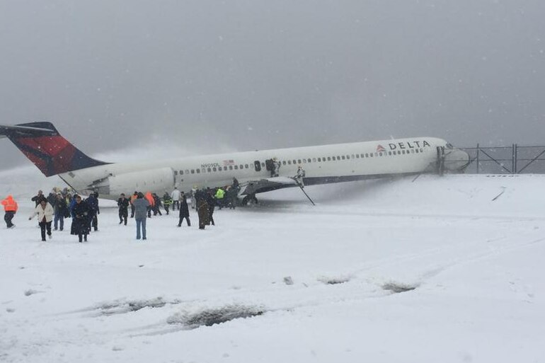 Delta plane skids off runway at New York's La Guardia airport