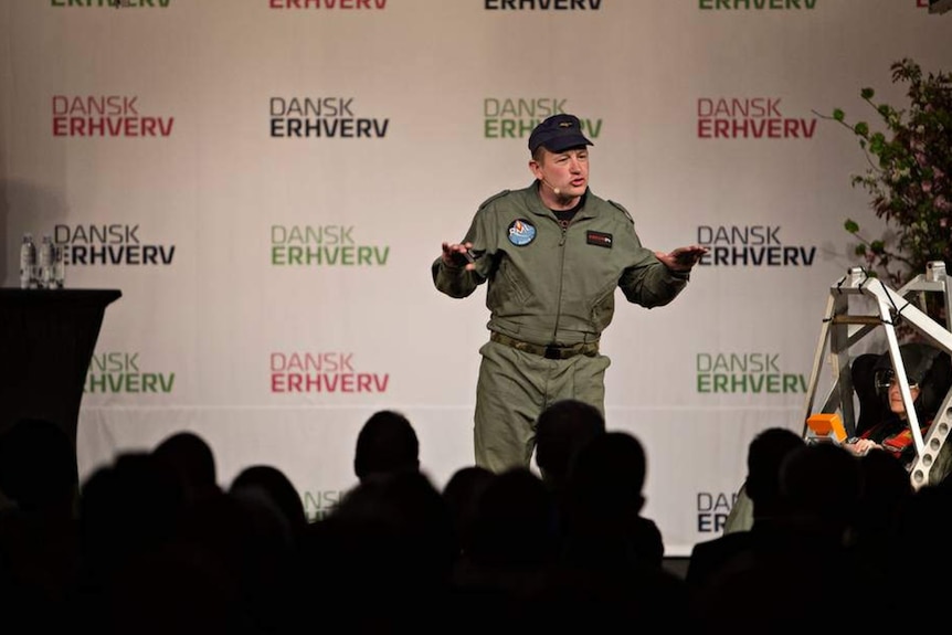 Danish engineer Peter Madsen speaking to a crowd at Dansk Erhverv