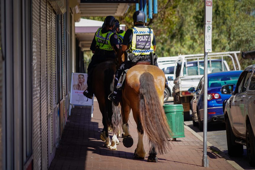 Horse police patrol through alice springs