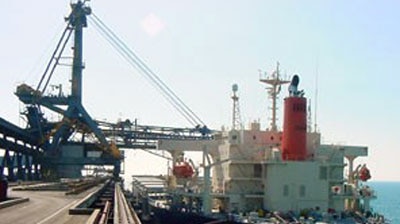 Coal gets loaded onto a docked ship at Dalrymple Bay Coal Terminal, one of the largest coal export ports in the world