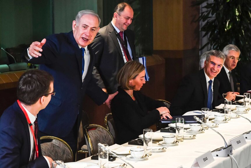 Israeli Prime Minister Benjamin Netanyahu, second left, speaks with EU foreign ministers
