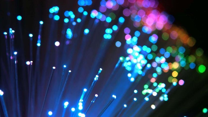 Light streams through fibre optic cables