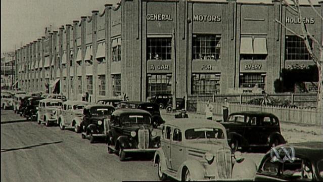 Old photo of Holden cars outside factory