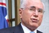 Going the distance: Prime Minister John Howard announcing the election date yesterday