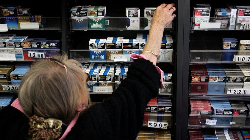 The new laws require cigarettes to be hidden from sight in shops