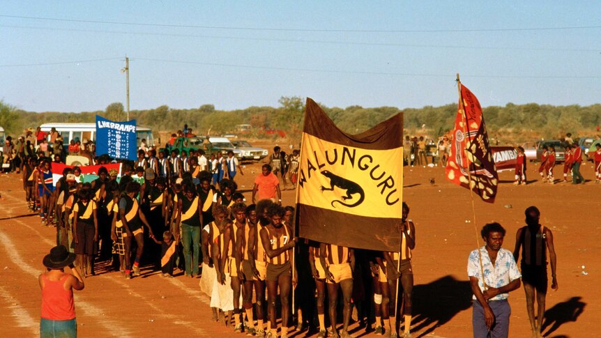 A sports march in Yuendumu in the NT in the 1980s.