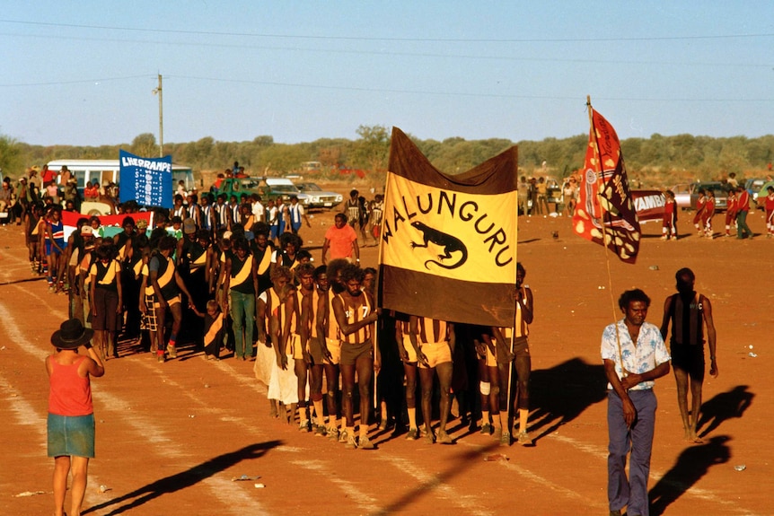 A sports march in Yuendumu in the NT in the 1980s.