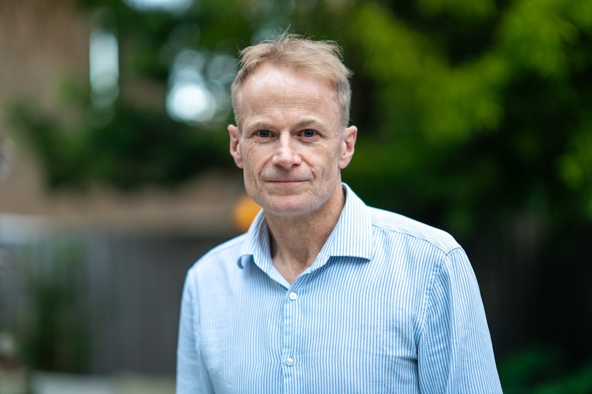 Professor Richard Scolyer looking at the camera with a neutral experssion.