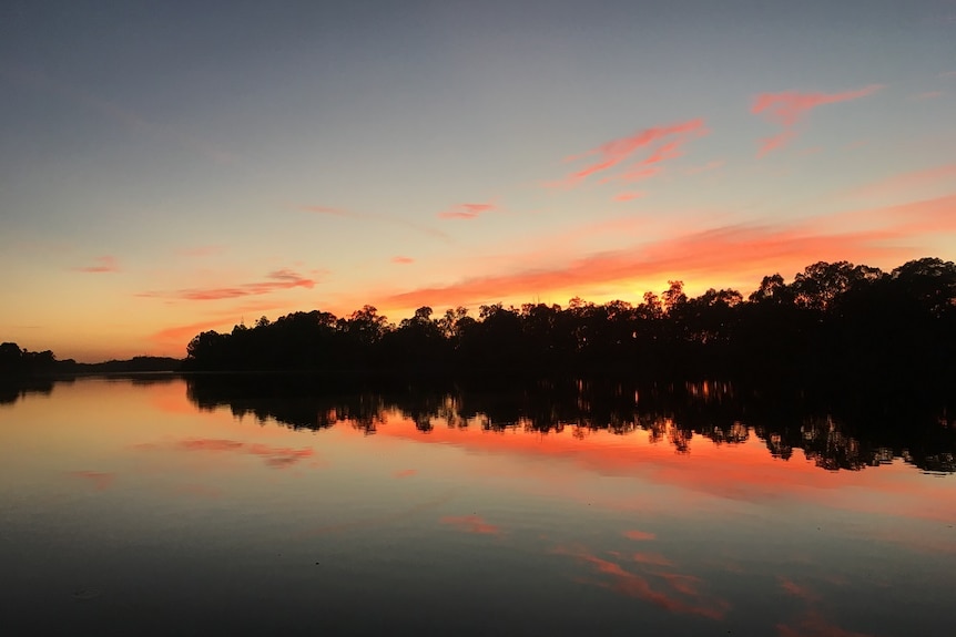 The sun rising over the River Murray at Renmark, South Australia.