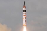 A surface-to-surface Agni V missile is launched from off the eastern Indian state of Odisha