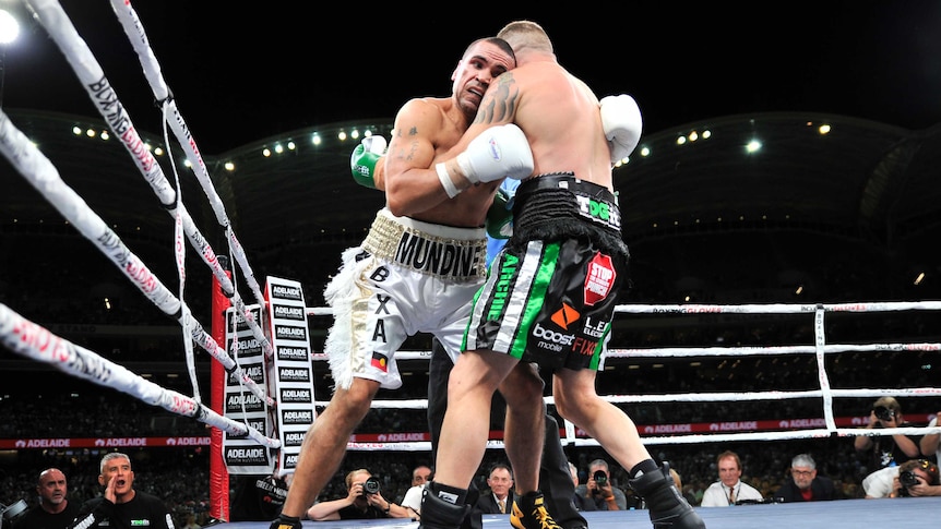 Anthony Mundine clinches with Danny Green