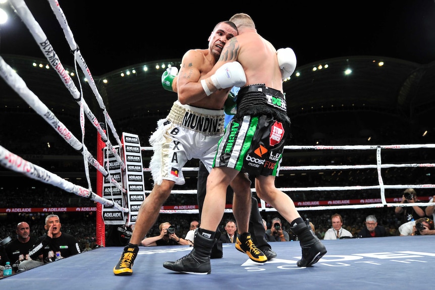 Anthony Mundine clinches with Danny Green