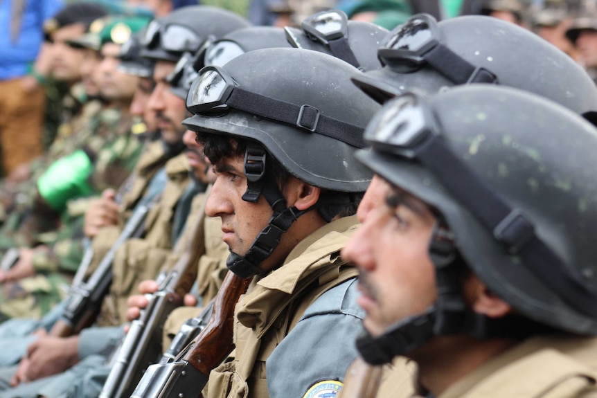 A close shot of Afghan military men lined up, 2016.