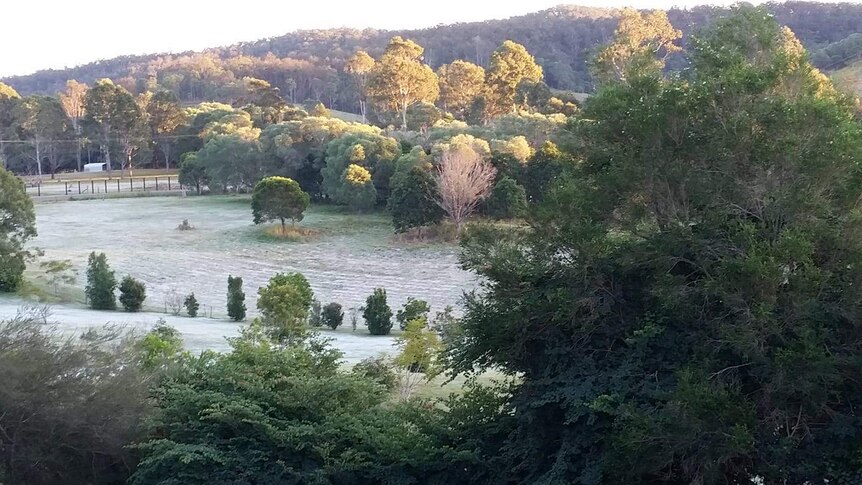 A farming property is covered by frost