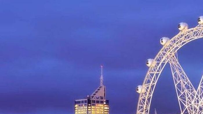 The Southern Star observation wheel sits with the Melbourne skyline behind