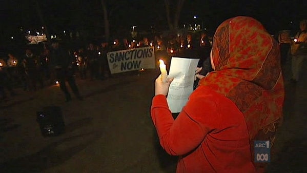 Protest: Around 100 protesters held a candlelight vigil outside the Israeli Embassy last night.