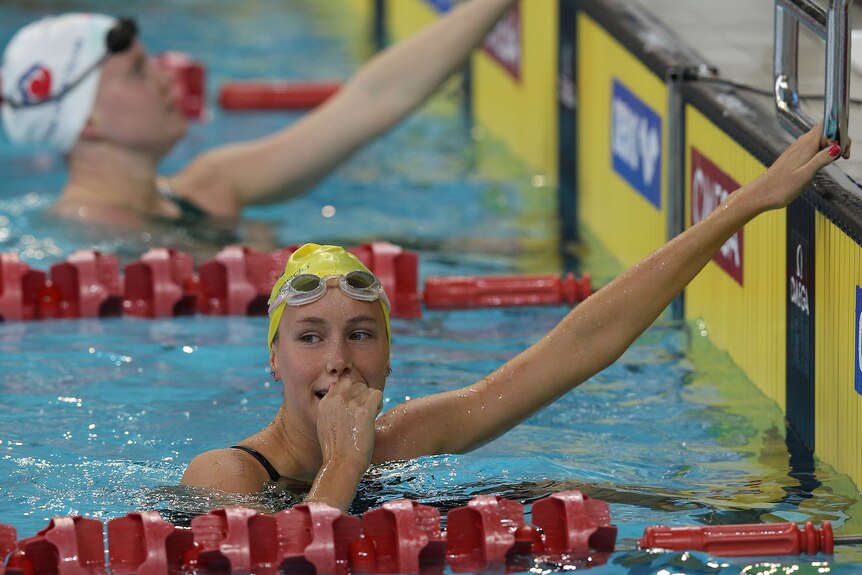 World Cup win ... Emma McKeon reacts after winning the 100m freestyle final.