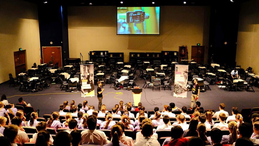 Students at Cannon Hill Anglican College in Brisbane learn about making video content in a lecture theatre.