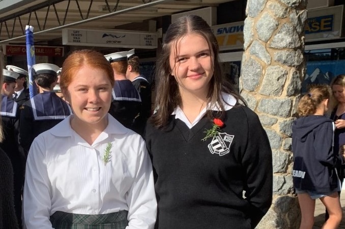 School students Molly and Marlee at Perisher resort during an Anzac service.