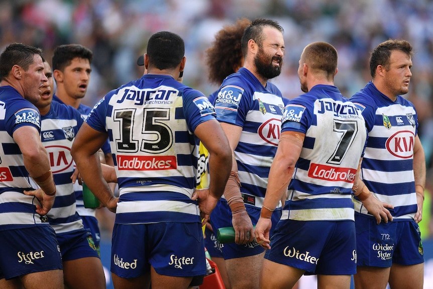Canterbury Bulldogs players look upset after conceding a late try